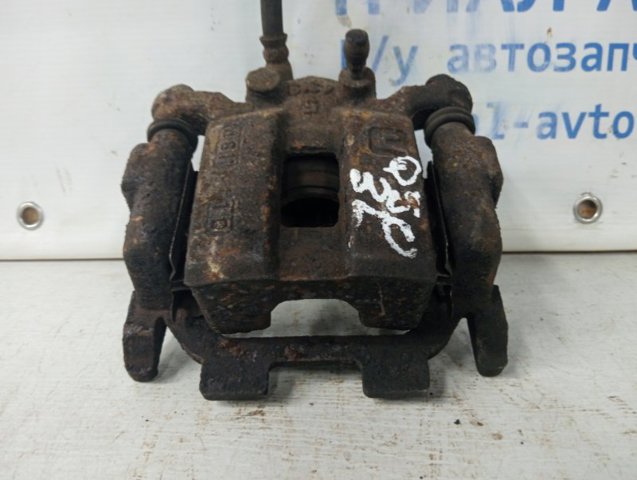 440111AA0A NISSAN Суппорт тормозной задний левый купить в Киев