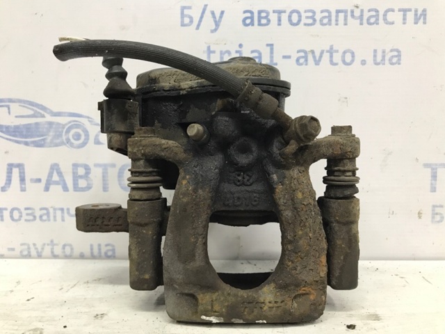Задний левый суппорт 440114CA0A NISSAN