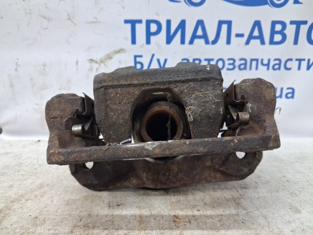 NISSAN 44011EB30A Суппорт тормозной задний левый в наличии Киев