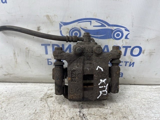 Тормозной суппорт задний левый 44011JG00A NISSAN
