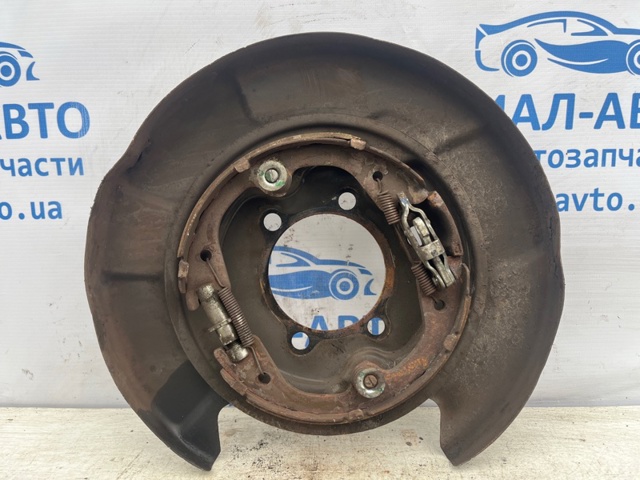 Пыльник тормозного диска заднего левый 440303JA0C NISSAN