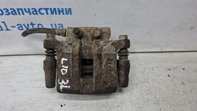 Задний левый суппорт 4605A263 MITSUBISHI