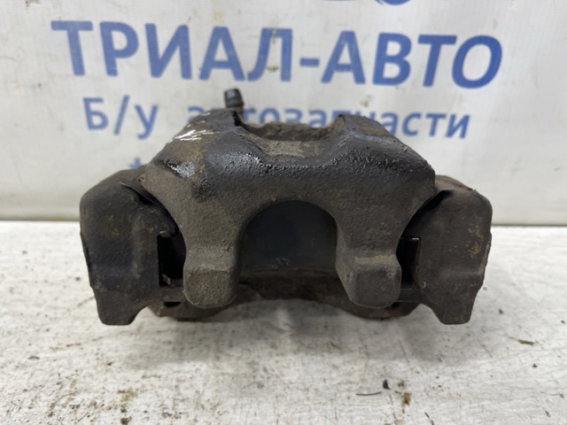 Задний правый суппорт 4773048040 TOYOTA