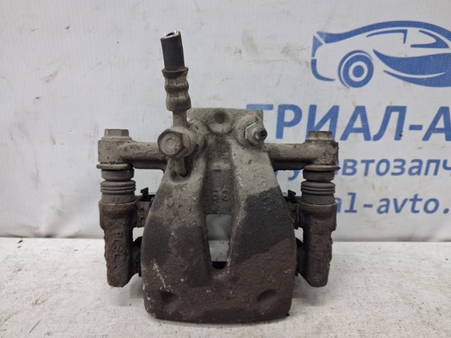 Тормозной суппорт задний левый 4775005071 TOYOTA