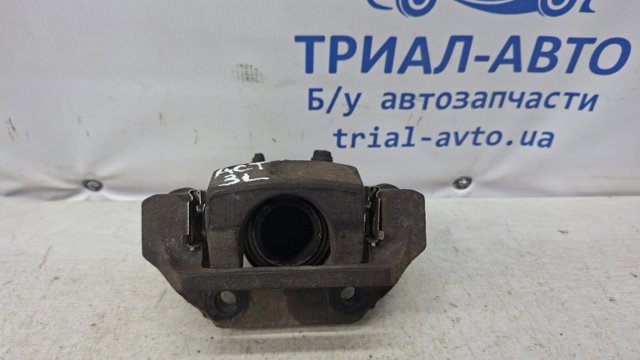 Суппорт тормозной левый задний 4841009000 SSANG YONG
