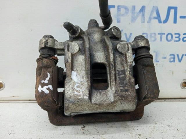 Суппорт тормозной левый задний 4841034050 SSANG YONG