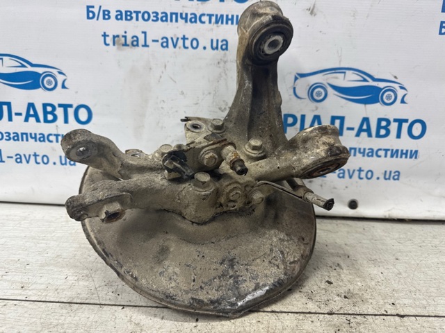 52215SNAA50 Цапфа (поворотный кулак) задний левый купить Ирпень