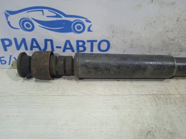 Стойка амортизатора задняя 56200AX602 NISSAN