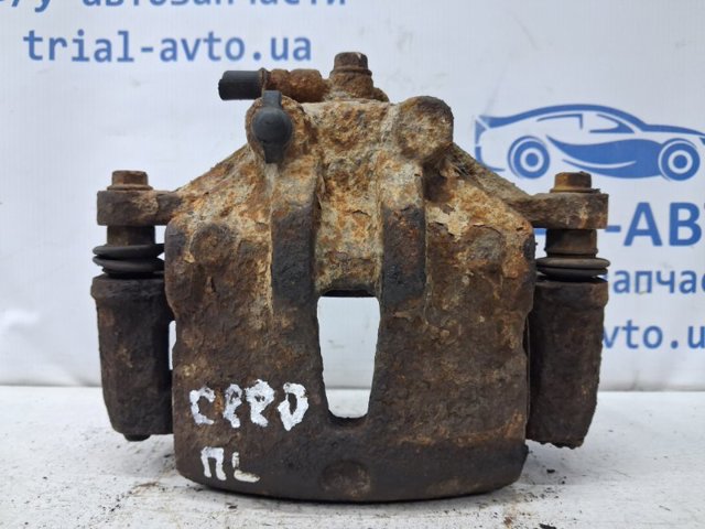 581101H000 HYUNDAI Суппорт тормозной передний левый купить в Чернигов