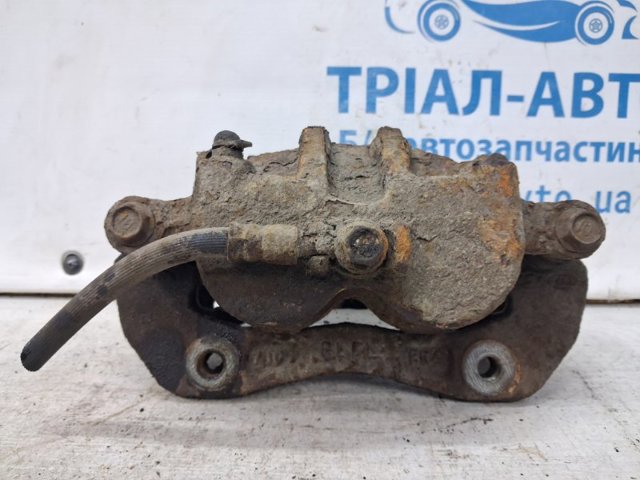 581103E600 HYUNDAI Суппорт тормозной передний левый купить в Киев