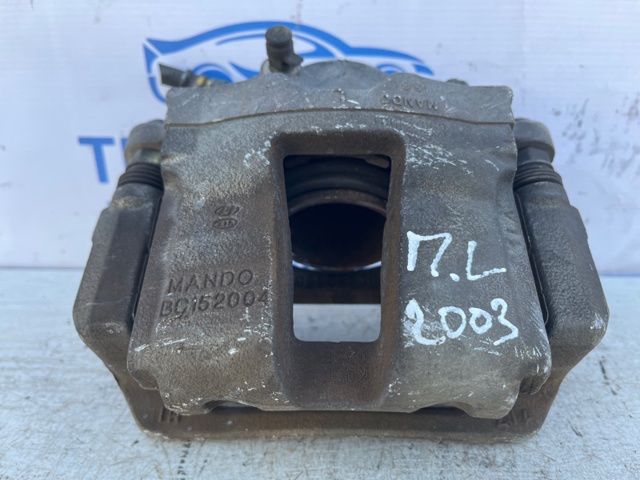 Суппорт тормозной передний левый 581103Q500 HYUNDAI
