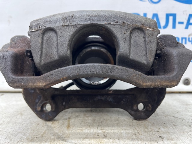 Суппорт тормозной, передний, правый 58130D7500 HYUNDAI