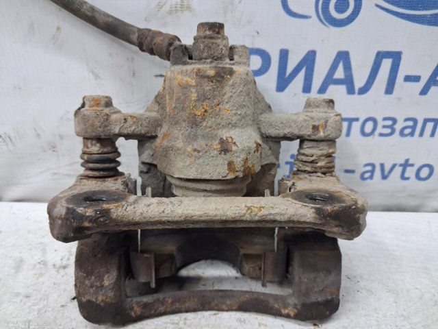 Суппорт тормозной левый задний 582101H300 HYUNDAI
