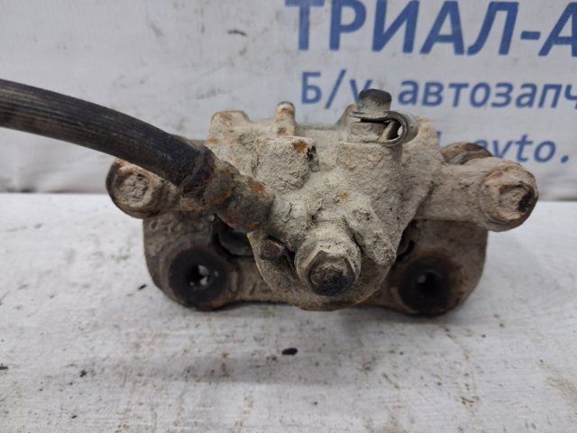 HYUNDAI 582101H300 Суппорт тормозной задний левый в наличии Ужгород