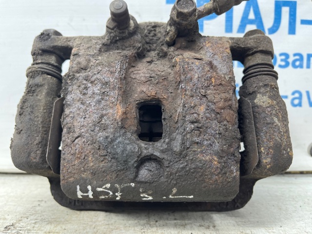 Тормозной суппорт задний левый 582102P700 HYUNDAI