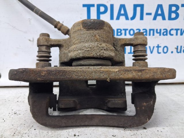 582102W700 HYUNDAI Суппорт тормозной задний левый купить в Ужгород
