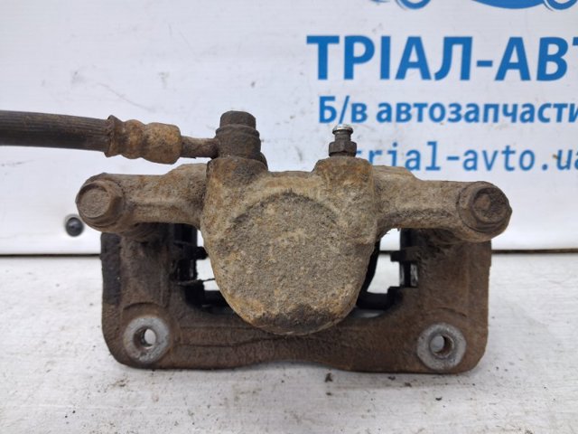 HYUNDAI 582102W700 Суппорт тормозной задний левый в наличии Каменское