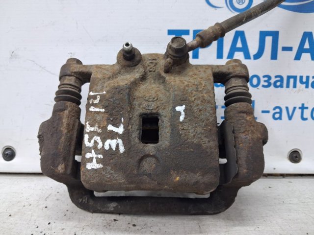 Суппорт тормозной левый задний 582102W700 HYUNDAI