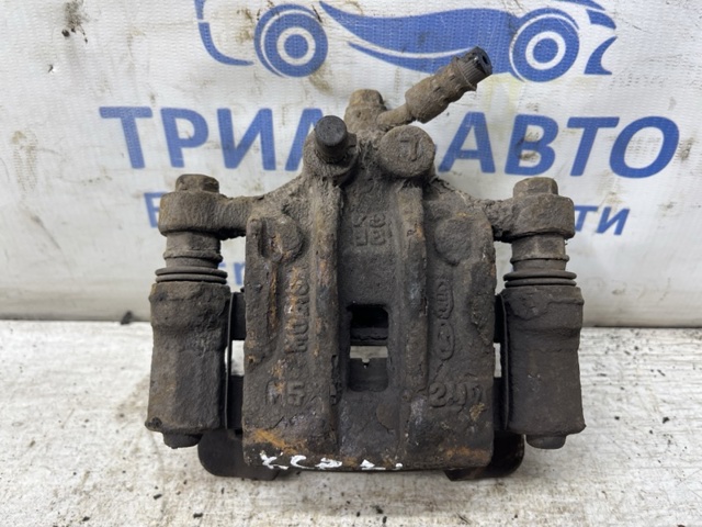 582102Y500 Суппорт тормозной задний левый купить Харьков