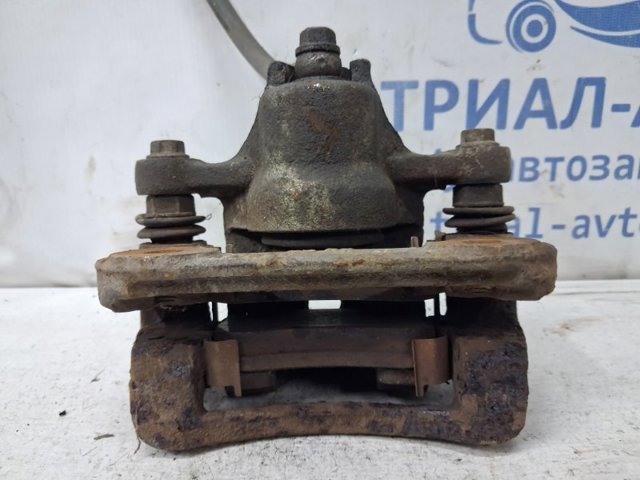 Задний правый суппорт 582301H300 HYUNDAI