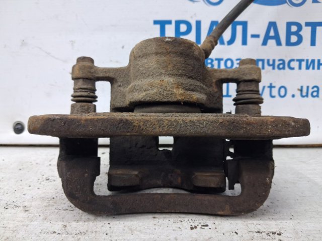 582302W700 HYUNDAI Суппорт тормозной задний правый купить в Харьков
