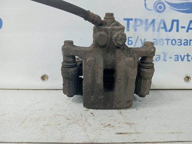 582302Y310 HYUNDAI Суппорт тормозной задний правый купить в Днепр