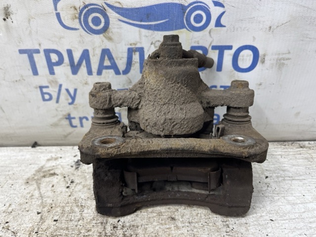 Суппорт тормозной задний правый 582302Y500 HYUNDAI