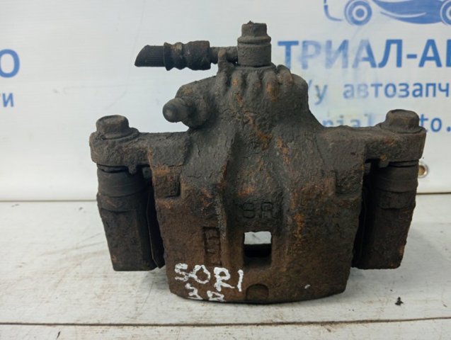 Тормозной суппорт правый задний 582303E000 HYUNDAI
