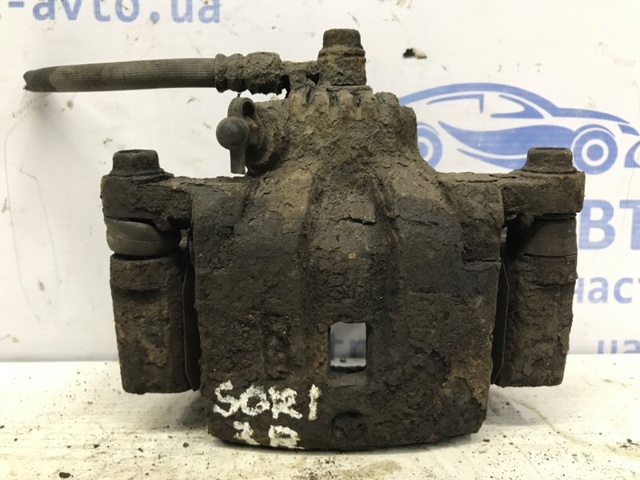 Задний правый суппорт 582303E600 HYUNDAI