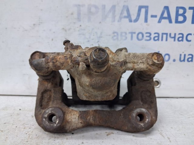 HYUNDAI 582303K050 Суппорт тормозной задний правый в наличии Сумы