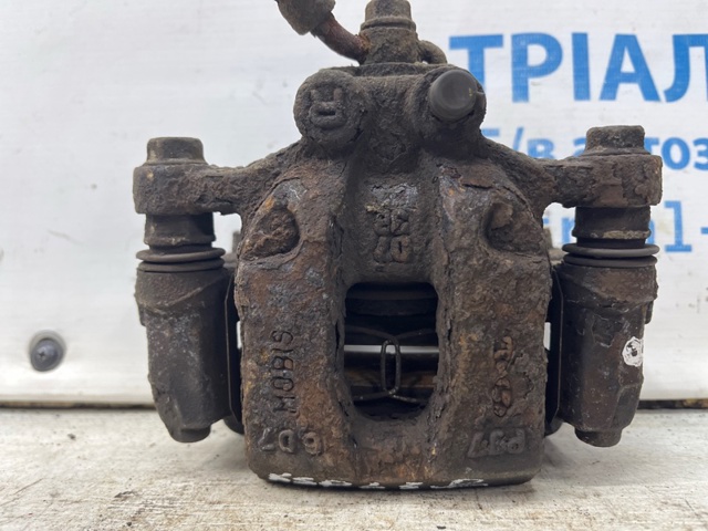 Тормозной суппорт правый задний 58230D7000 HYUNDAI