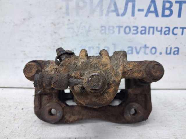 583102EA00 HYUNDAI Суппорт задний левый купить в Ужгород