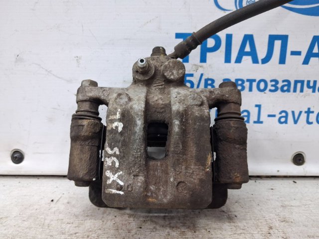 Задний левый суппорт 583102YA31 HYUNDAI