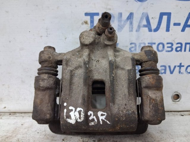 Тормозной суппорт правый задний 583111HA00 HYUNDAI