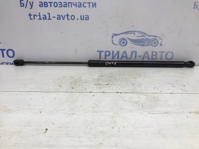 Амортизатор крышки багажника 63260AL040 SUBARU
