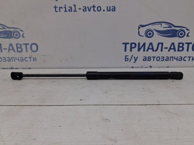 Амортизатор капота левый 654714GA0A NISSAN