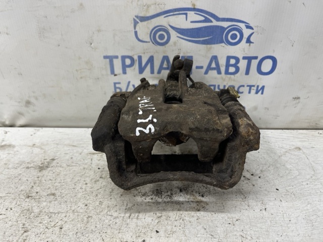Суппорт тормозной левый задний 7701056166 RENAULT