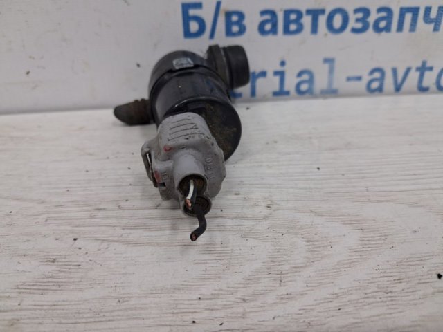 Мотор омывателя фар 8264A228 MITSUBISHI