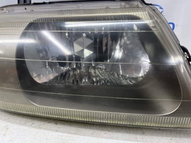 Стекло правого фонаря 8301A366 MITSUBISHI