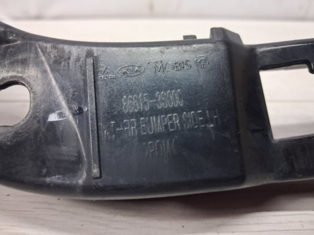 Левый кронштейн заднего бампера 866133S000 HYUNDAI