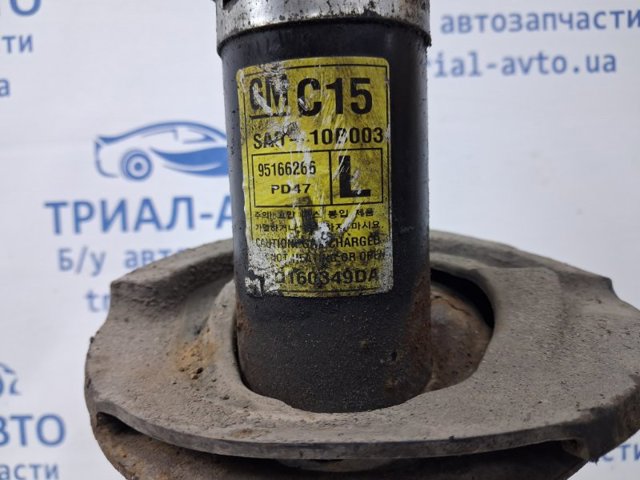 Амортизатор подвески передний левый 95147607 GM