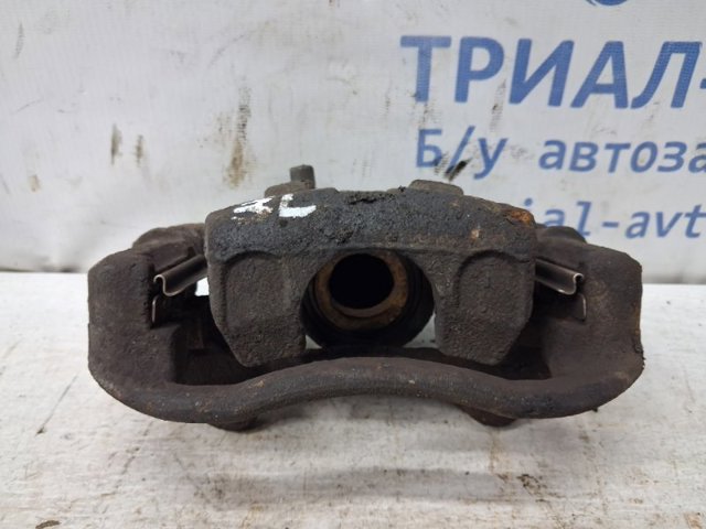 Суппорт тормозной левый задний 96475840 GM