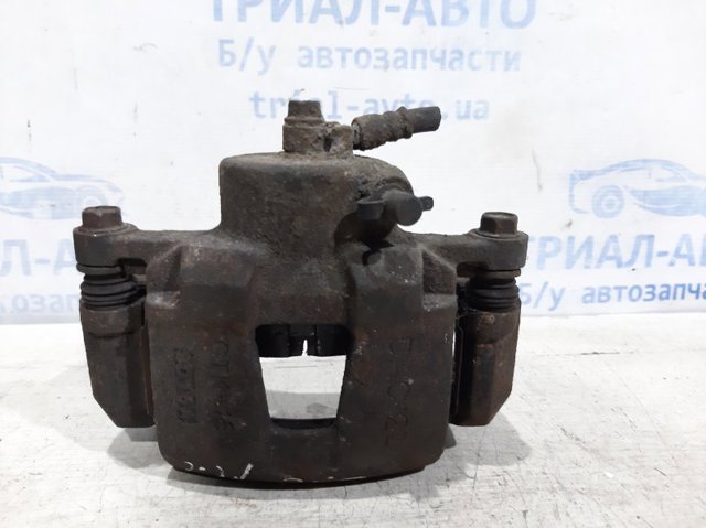 Суппорт тормозной, передний, левый 96549788 GM