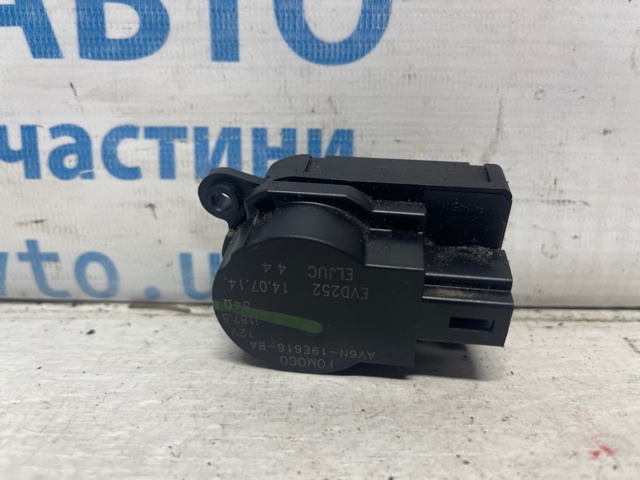 Привод системы автоматического управления отопителем AV6N19E616BA FORD
