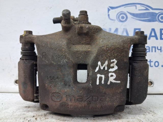 B4Y7-33-98ZB Mazda Суппорт тормозной передний правый