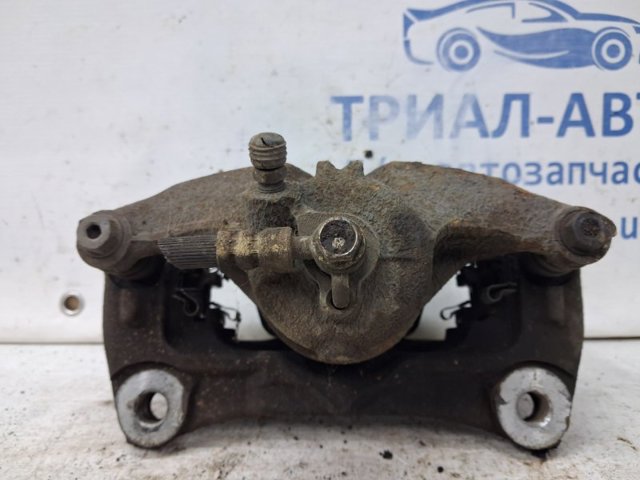 B4Y73399ZB Суппорт тормозной передний левый купить Винница