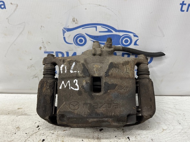Суппорт тормозной передний левый B4Y73399ZB MAZDA