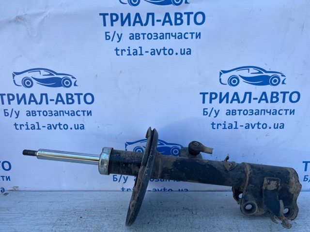 Амортизатор подвески передний левый E43023JA0B NISSAN