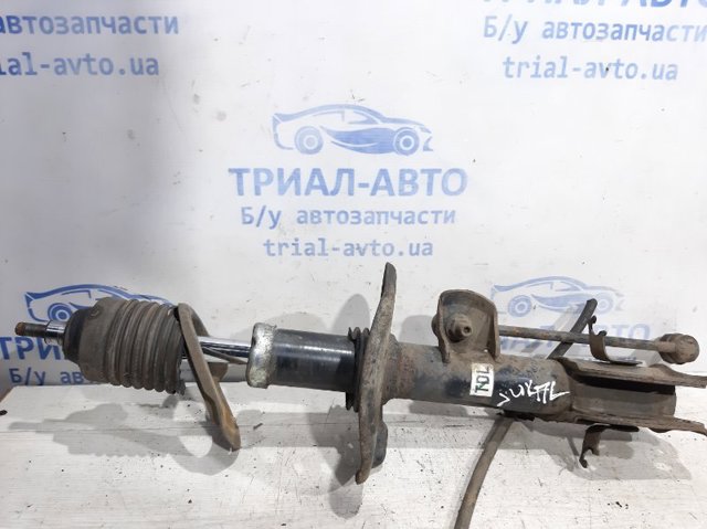 Амортизаторная стойка передняя левая E43031KC2A NISSAN