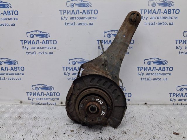 Цапфа (поворотный кулак) задний левый EG2528250B MAZDA